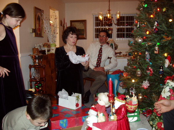 Colleen handing out gifts