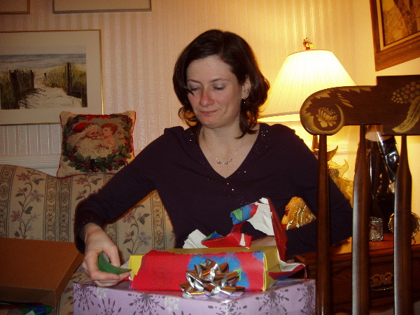 Maureen opening gifts