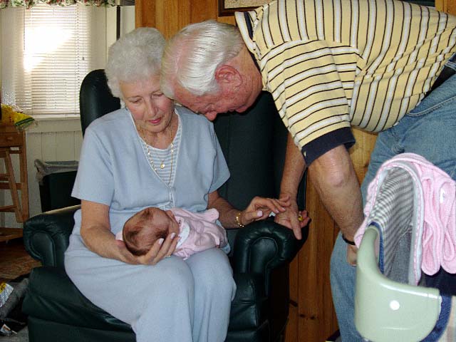 Mema and Papa holding Shannon